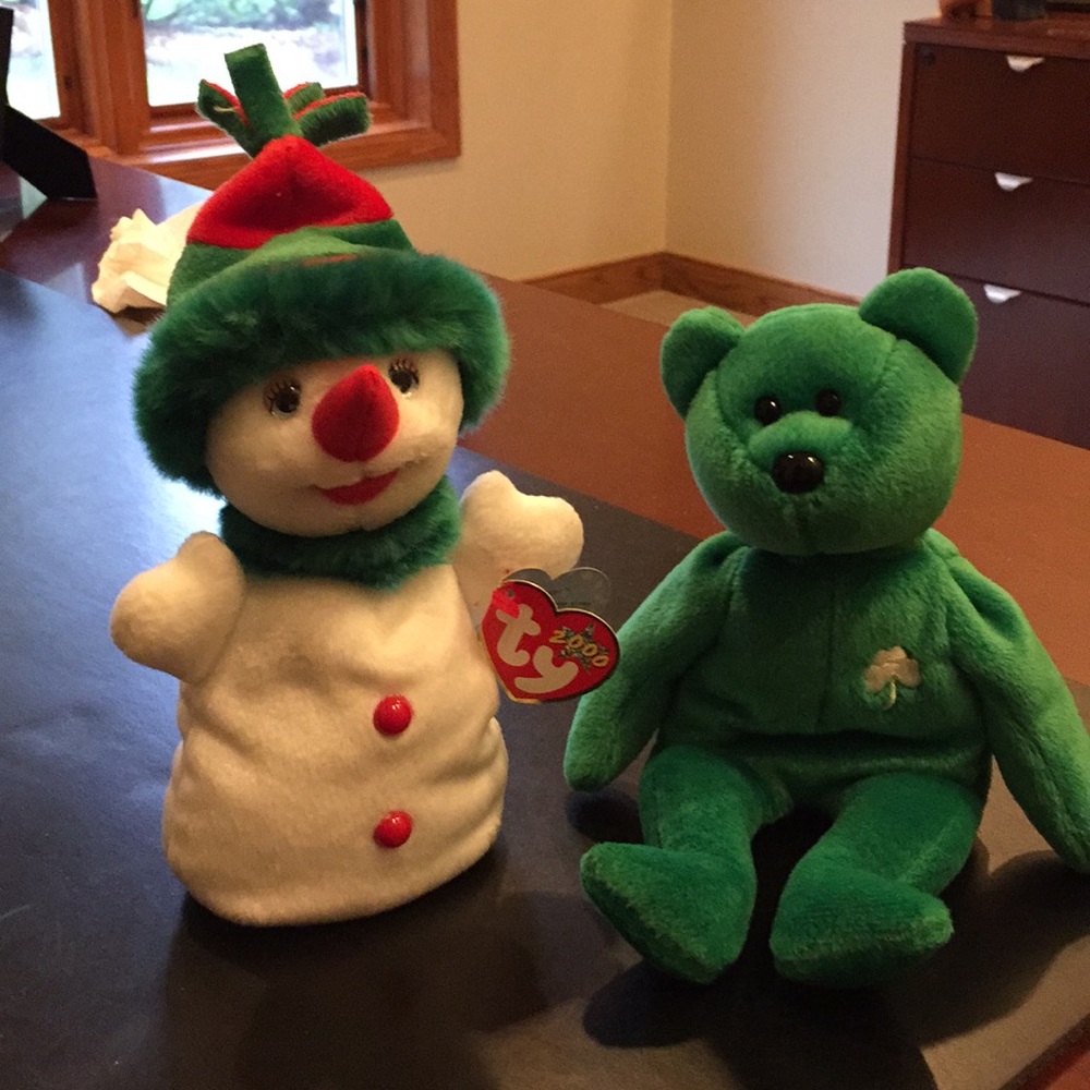 2 beanie babies one called Erin and Snowgirl
